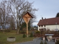 Cross planted by farmer in village